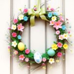 A beautifully crafted DIY Easter wreath with colorful decorations