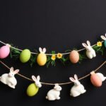 A handmade DIY Easter garland with colorful eggs and bunnies