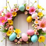 A beautiful DIY Easter wreath decorated with colorful eggs and flowers.
